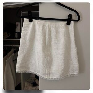 Edikted White Mini Skirt with Lace Trim